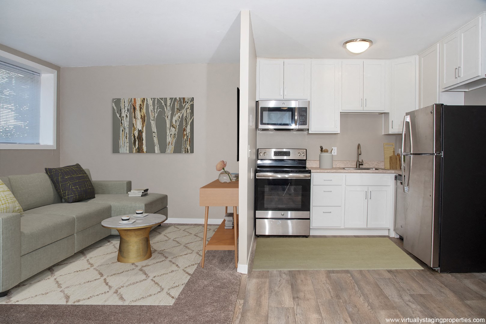 a kitchen and living room in a small apartment